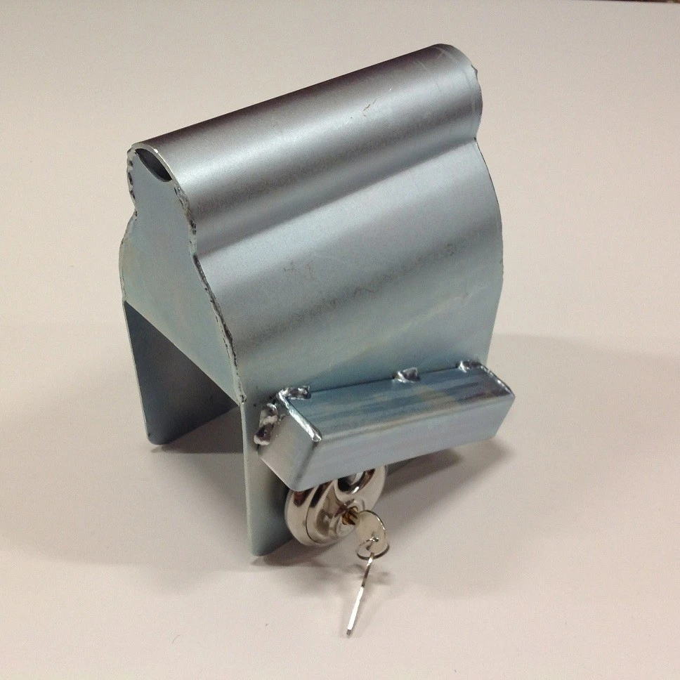 Koppelingsslot Tasje Met Discusslot. 1 Koppelingsslot Tasje Met Discusslot.